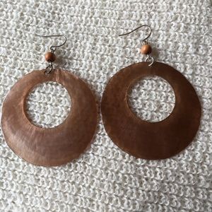 Brown shell hoop earrings with wooden bead